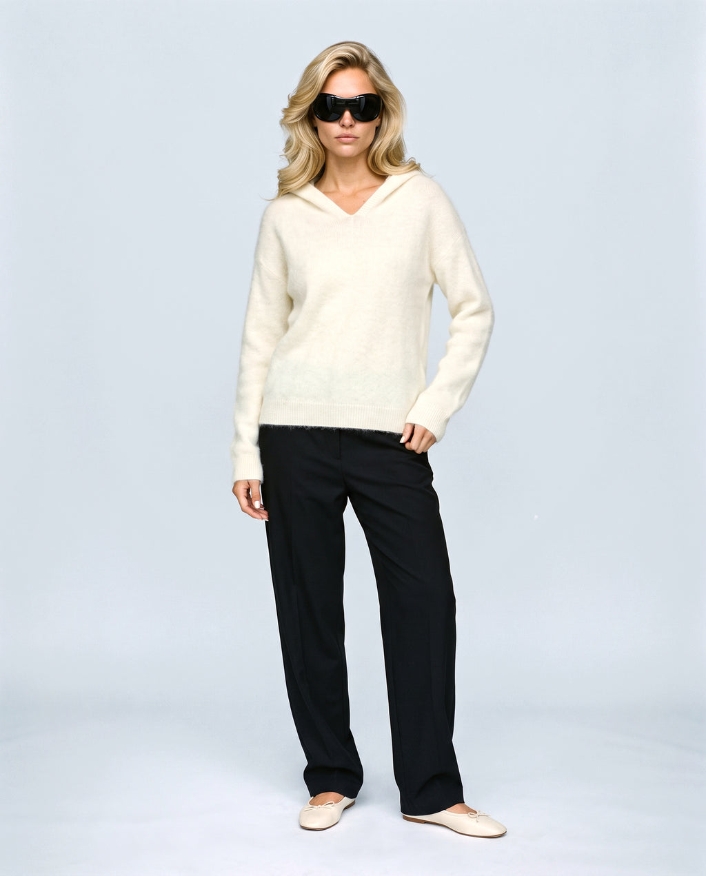 The Soft-Touch Knit Hoodie in Cream, front view on a non-pregnant model