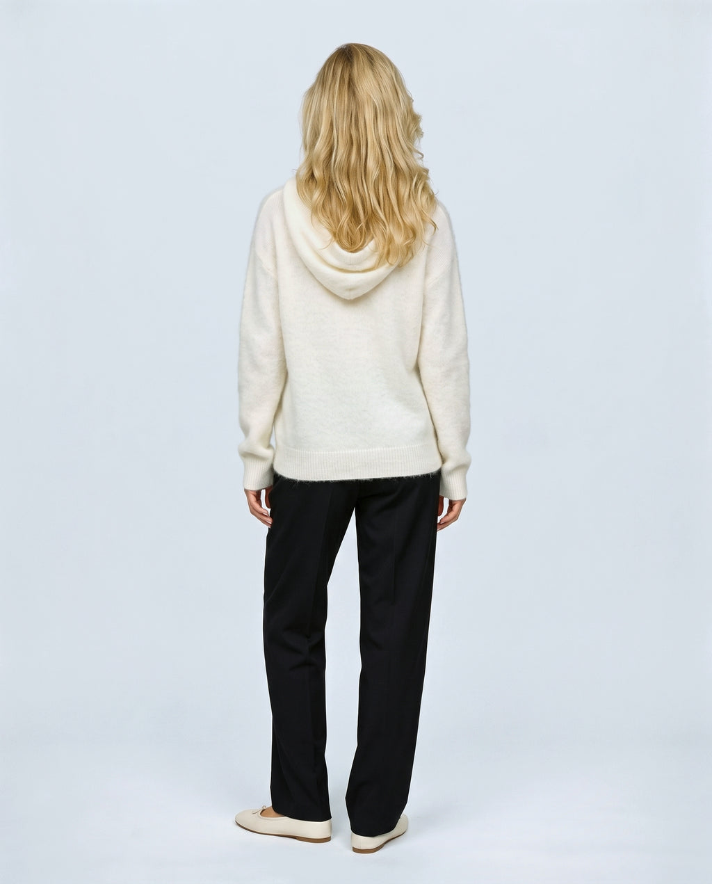 The Soft-Touch Knit Hoodie in Cream, back view on a non-pregnant model
