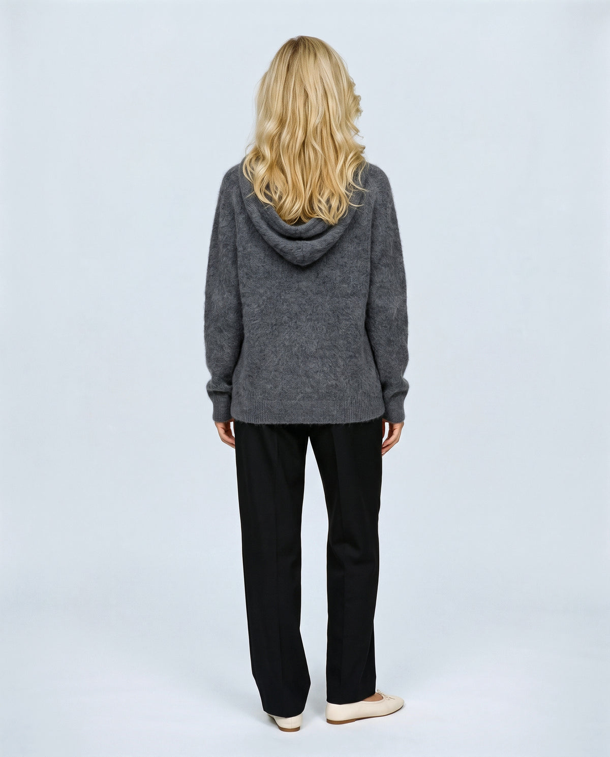The Soft-Touch Knit Hoodie in Grey, back view on a non-pregnant model