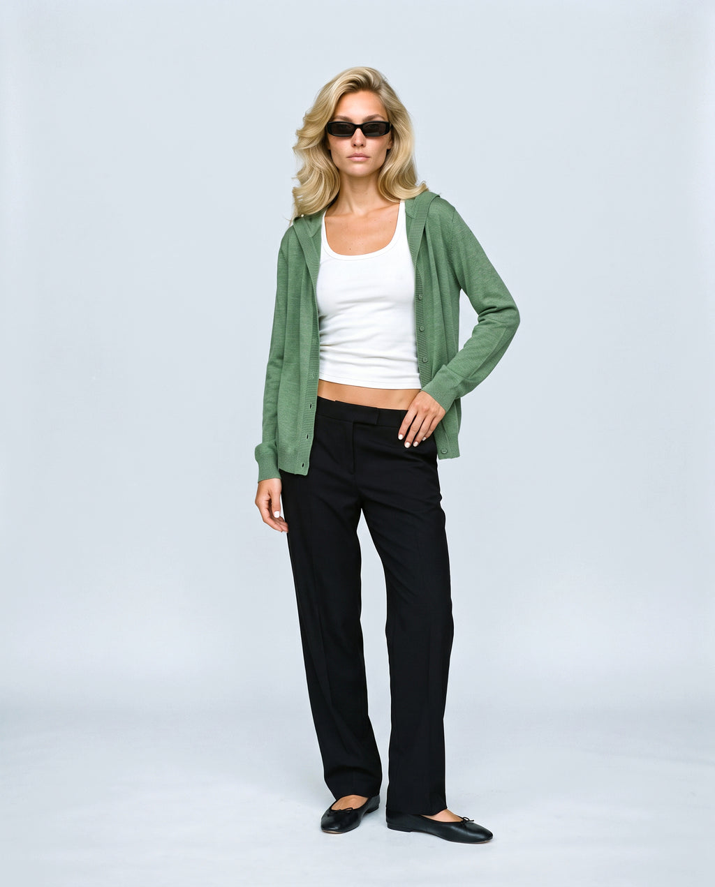 The Hooded Button Cardigan in Green, front view on a non-pregnant model
