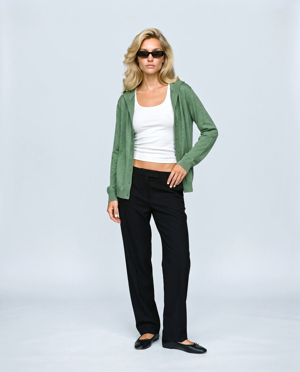 The Hooded Button Cardigan in Green, front view on a non-pregnant model