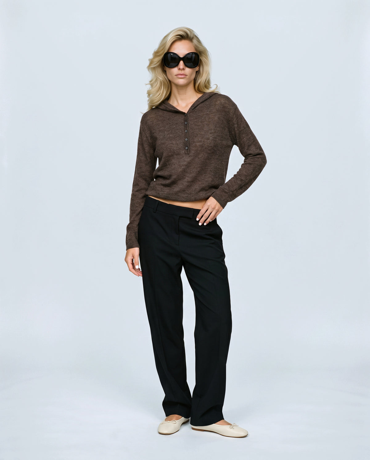 The Button-Neck Knit Hoodie in Brown, front view on a non-pregnant model