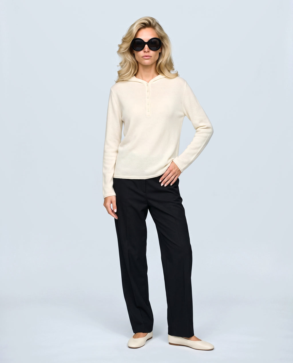 The Button-Neck Knit Hoodie in Cream, front view on a non-pregnant model