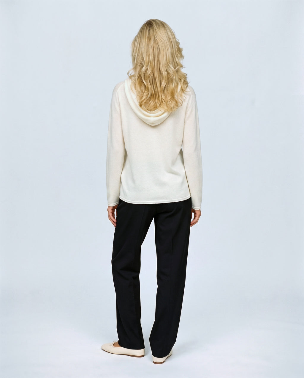The Button-Neck Knit Hoodie in Cream, back view on a non-pregnant model