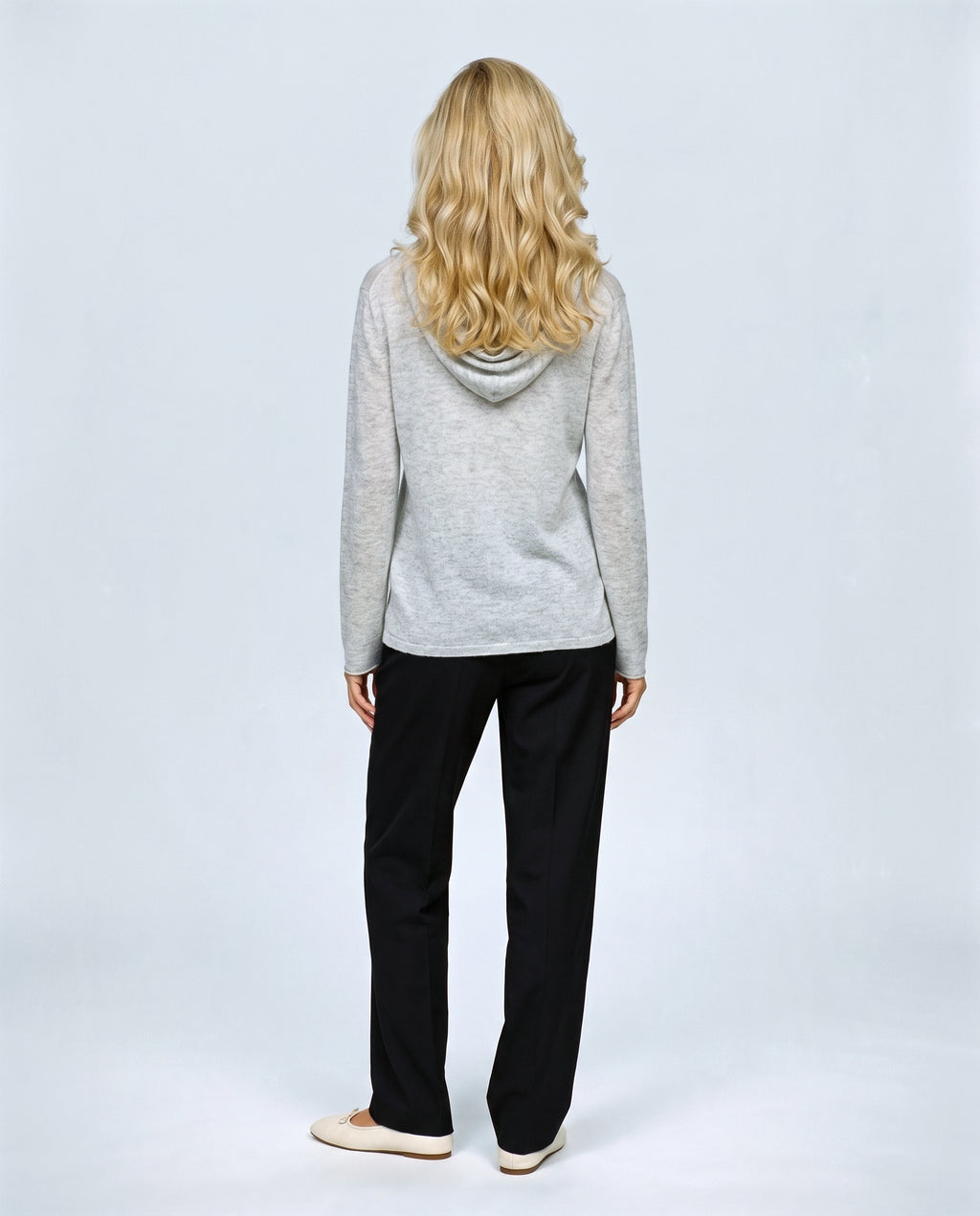 The Button-Neck Knit Hoodie in Grey, back view on a non-pregnant model