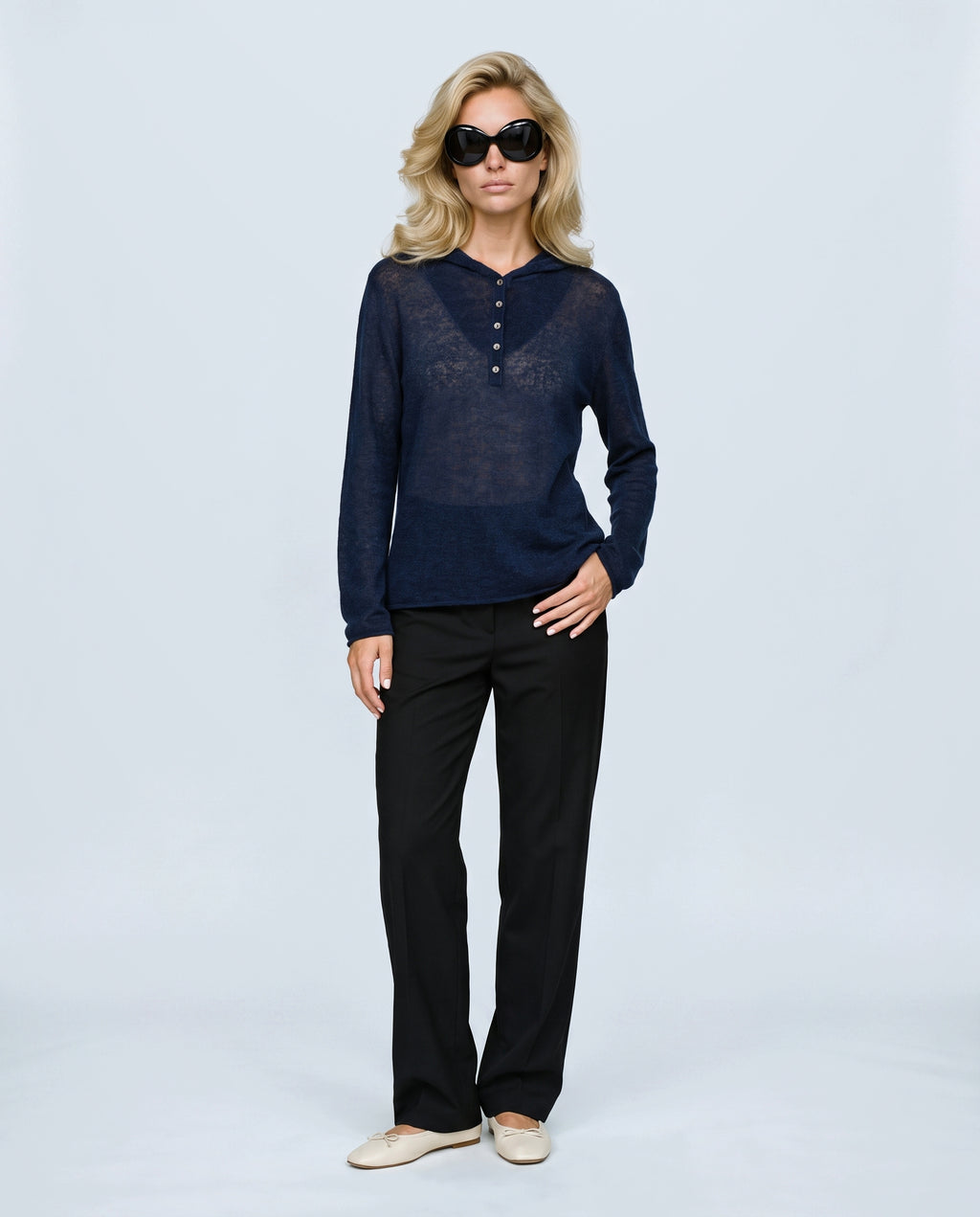 The Button-Neck Knit Hoodie in Navy, front view on a non-pregnant model