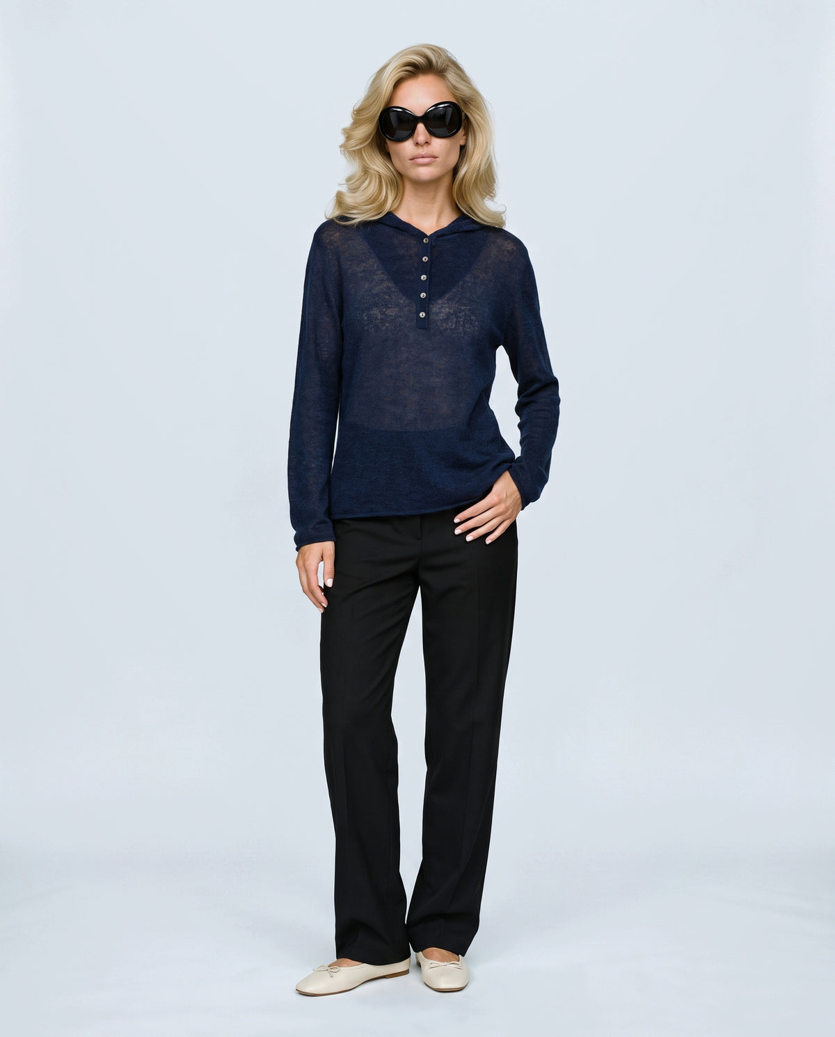 The Button-Neck Knit Hoodie in Navy, front view on a non-pregnant model
