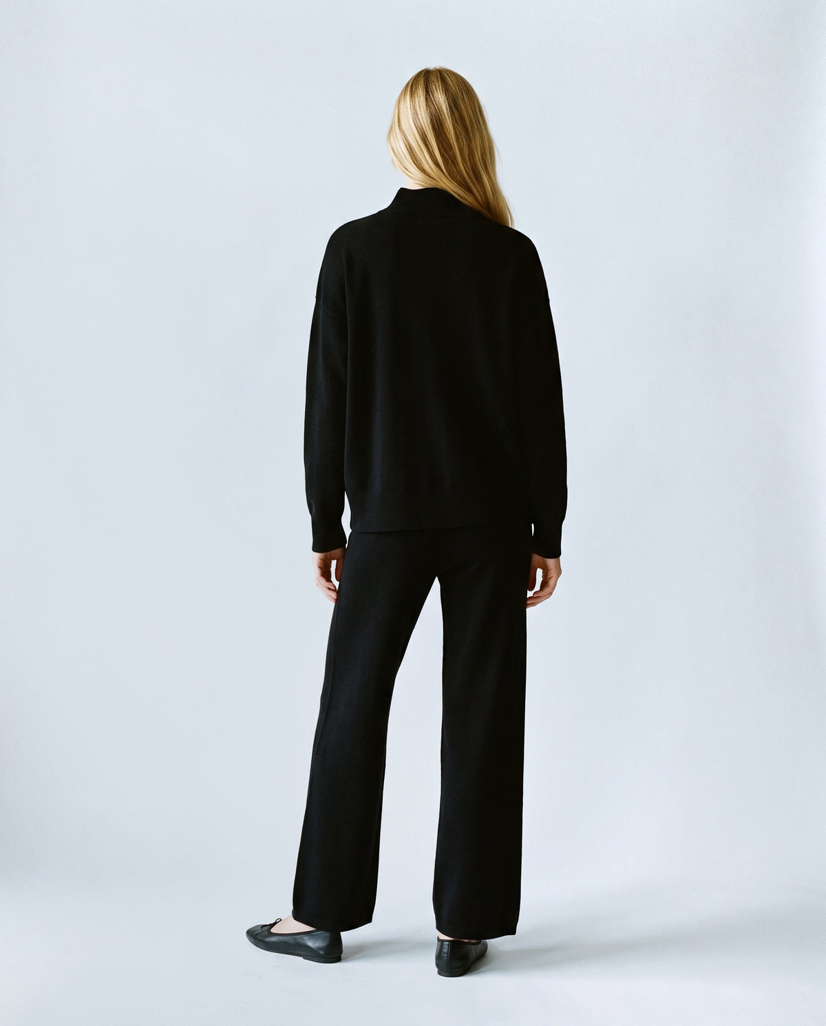 Chloe Split-Hem Knit Trouser Set in Black, back view on a non-pregnant model