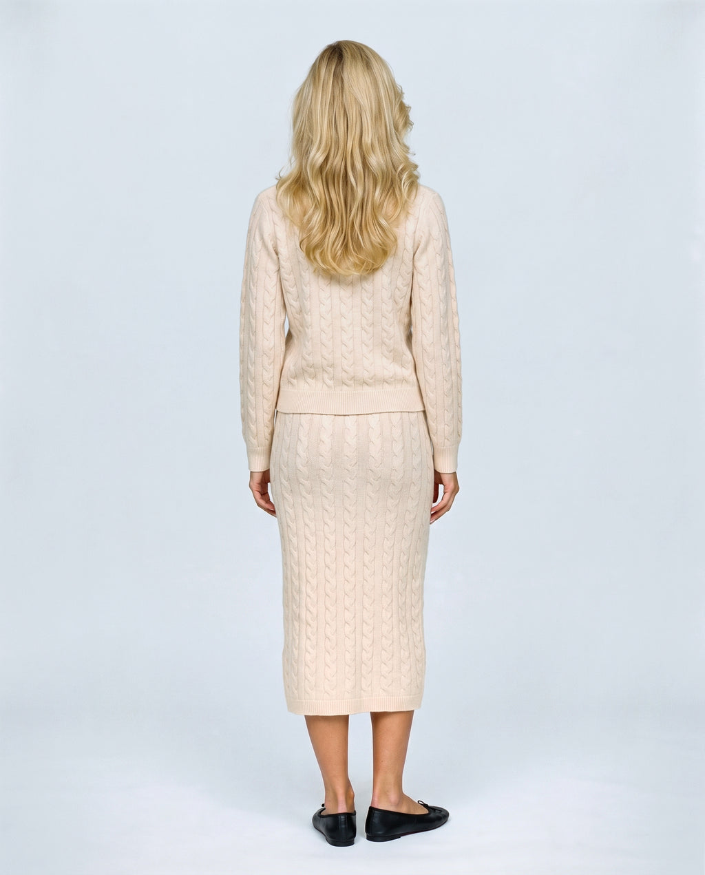 The Cable Knit Top & Skirt Set in Light apricot, back view on a non-pregnant model