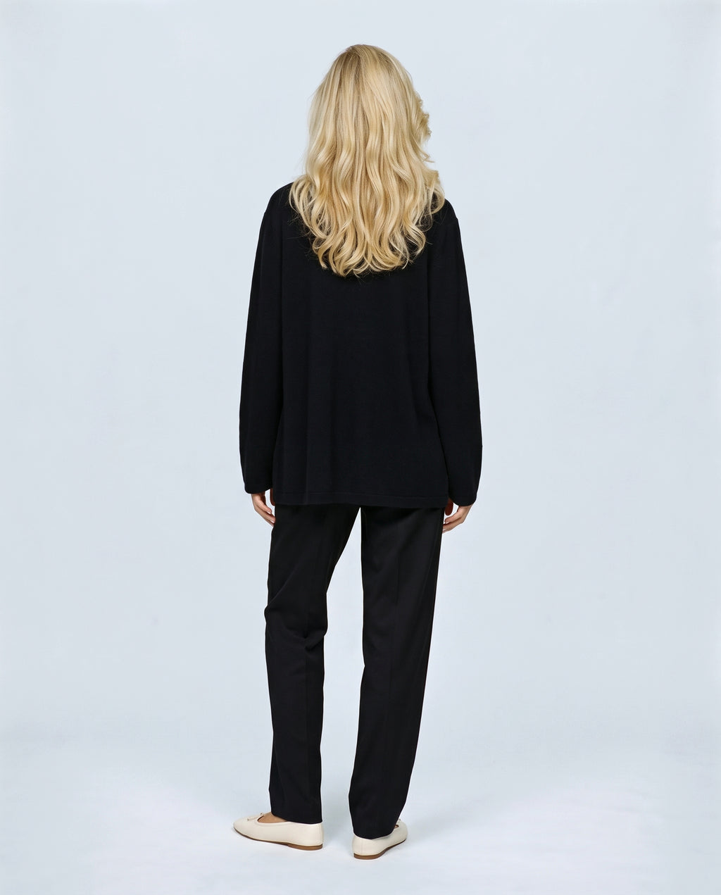 The Cardigan & Shell Twinset in Black, back view on a non-pregnant model