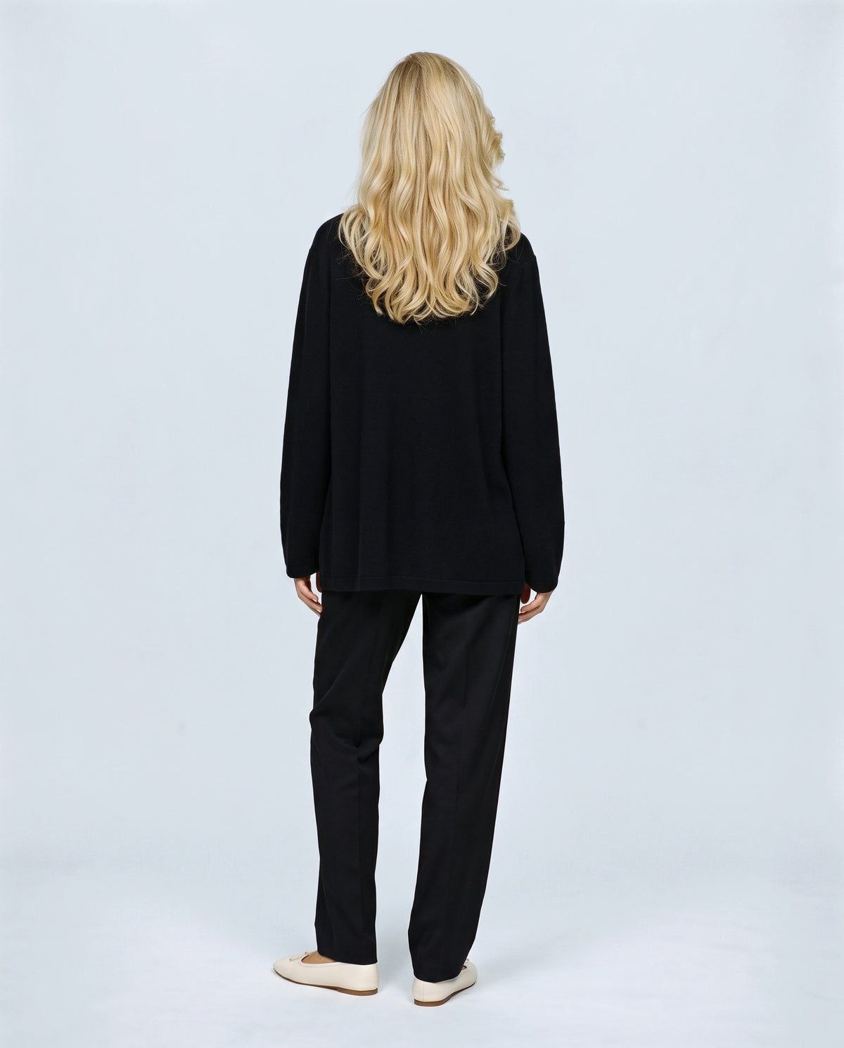 The Cardigan & Shell Twinset in Black, back view on a non-pregnant model