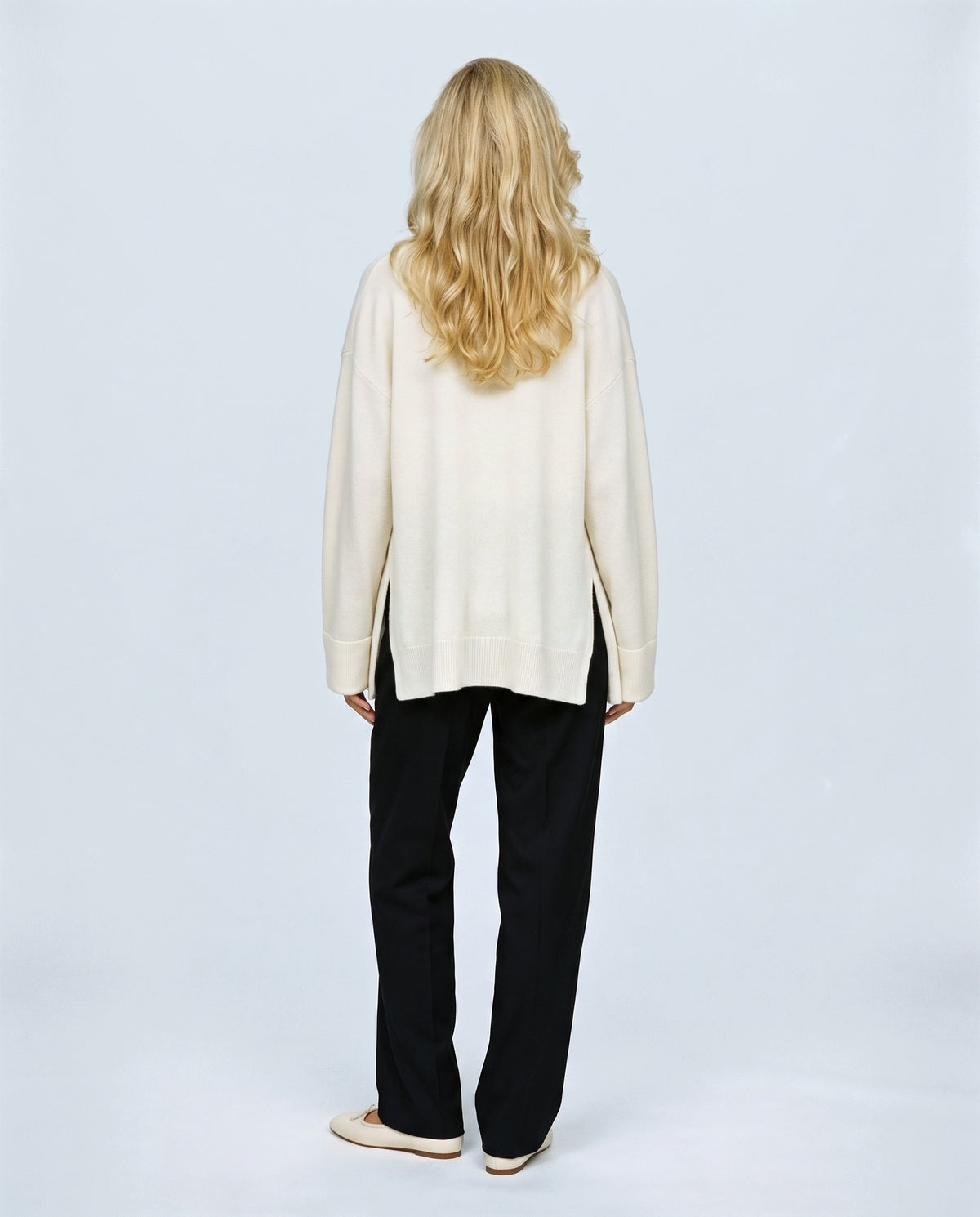 The Cardigan & Shell Twinset in Cream, back view on a non-pregnant model