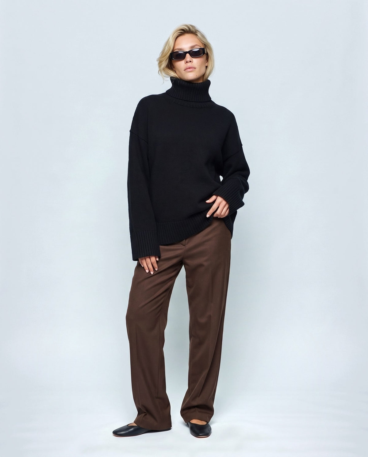 Nina Relaxed Turtleneck in Black, front view on a non-pregnant model