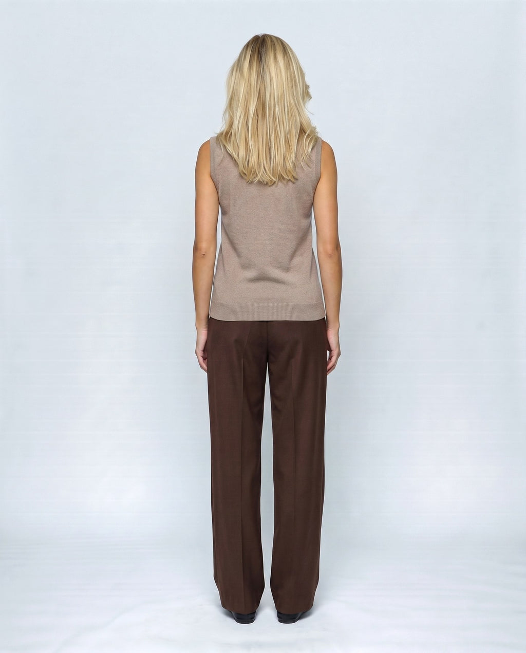 Noa Sleeveless Turtleneck in Camel taupe, back view on a non-pregnant model