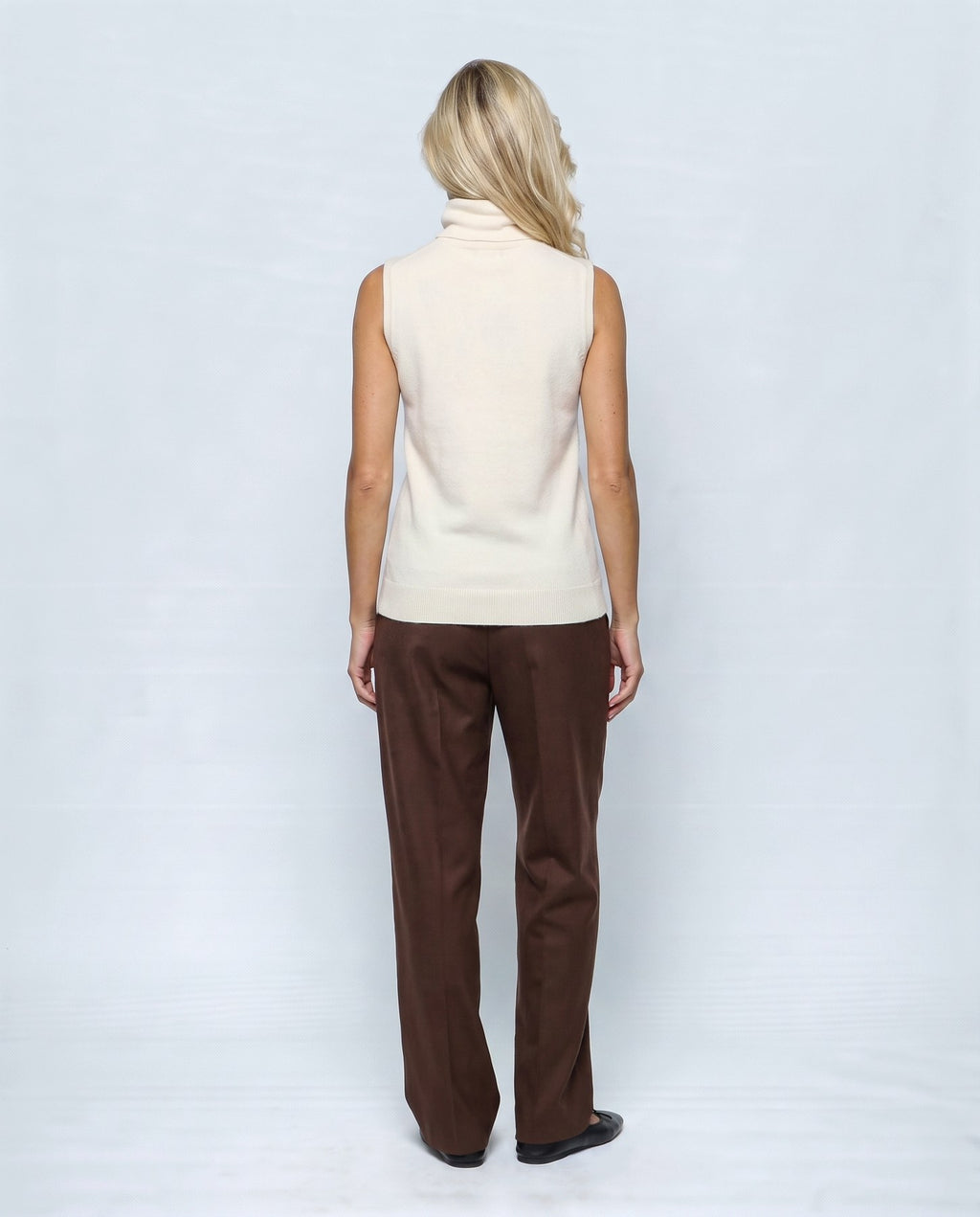 Noa Sleeveless Turtleneck in Cream white, back view on a non-pregnant model