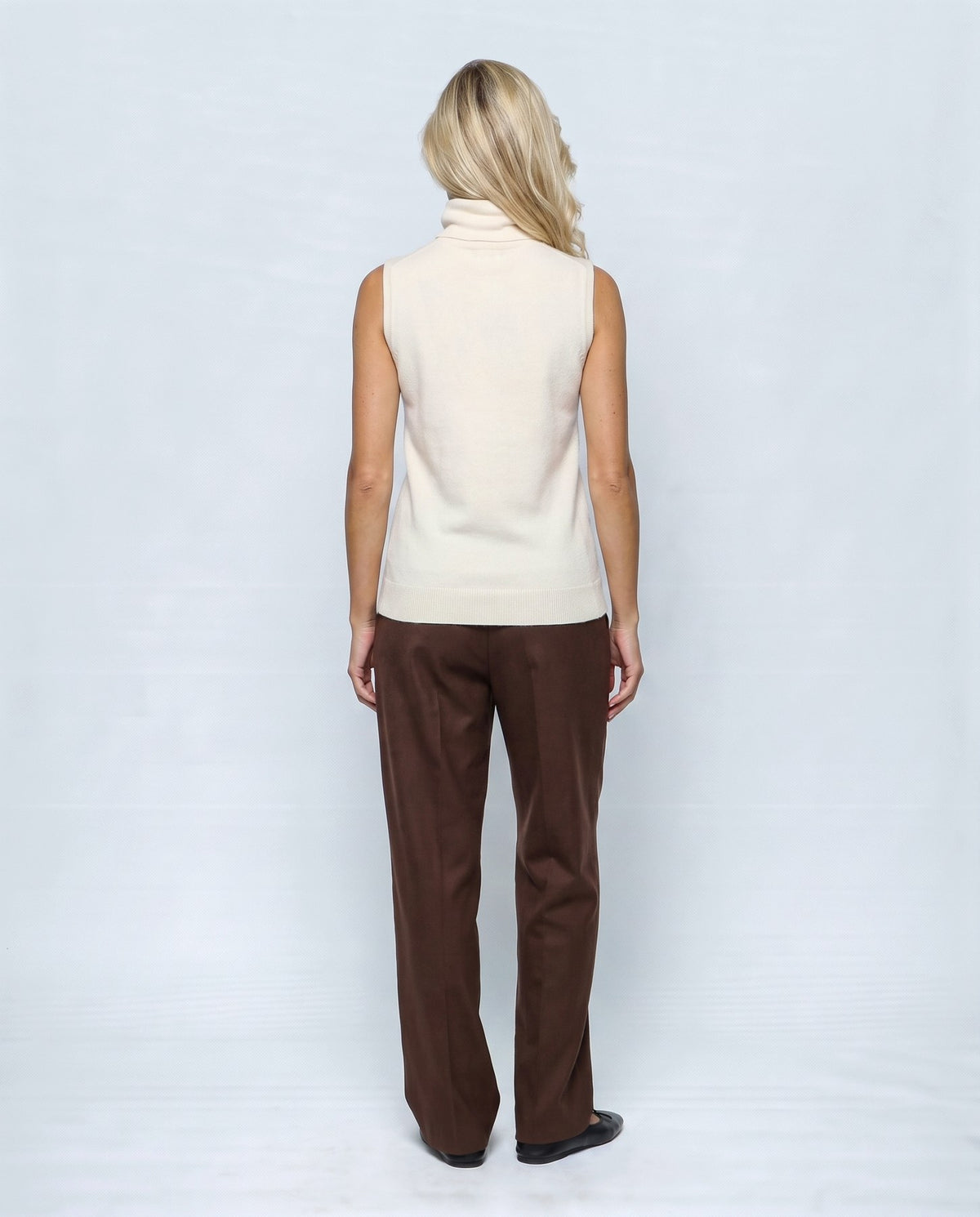 Noa Sleeveless Turtleneck in Cream white, back view on a non-pregnant model