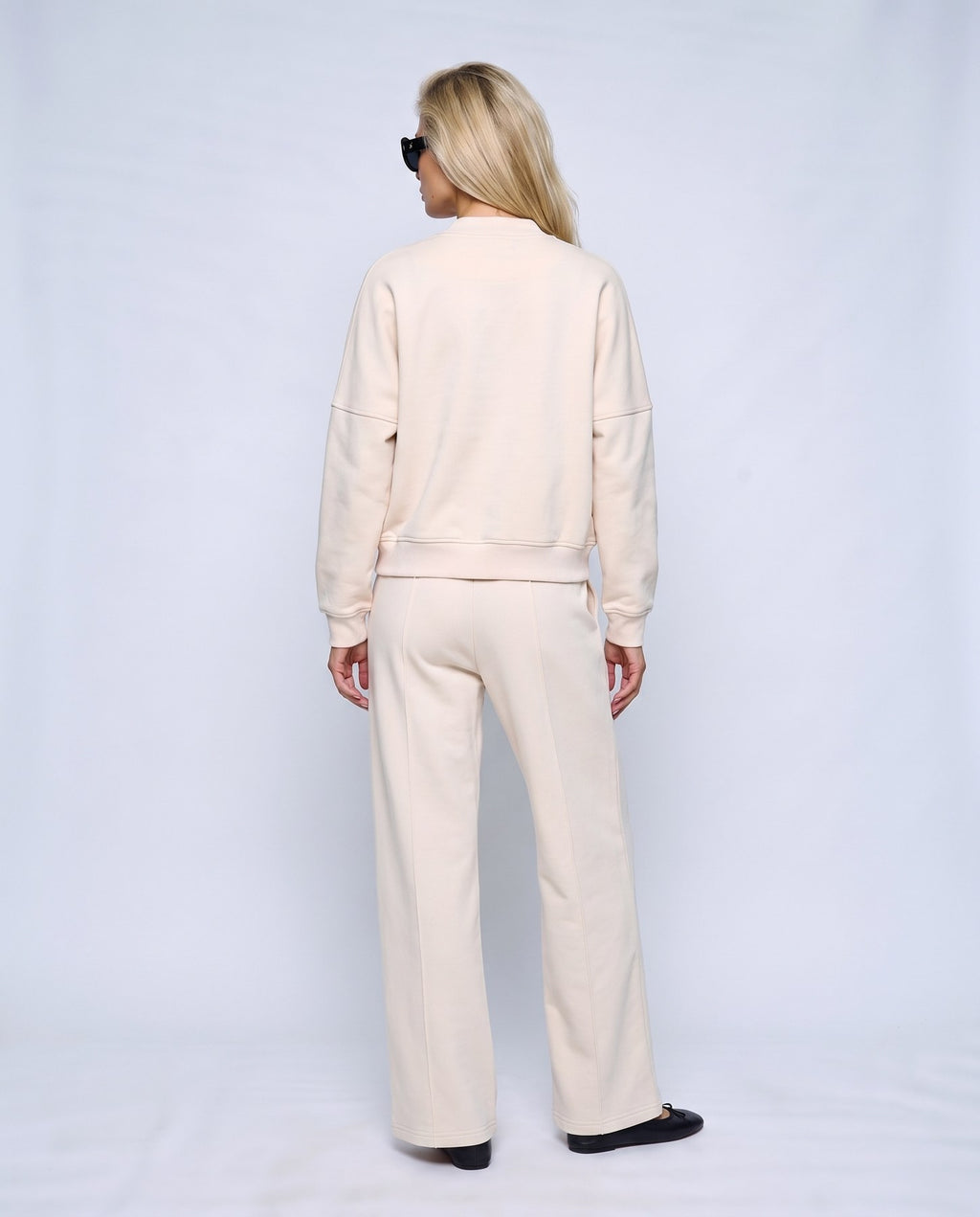 Sasha Zip Jacket & Pant Set in Beige, back view on a non-pregnant model