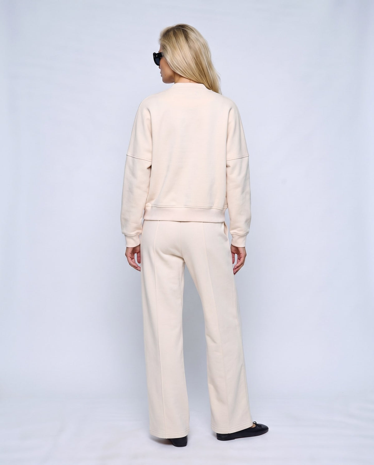 Sasha Zip Jacket & Pant Set in Beige, back view on a non-pregnant model