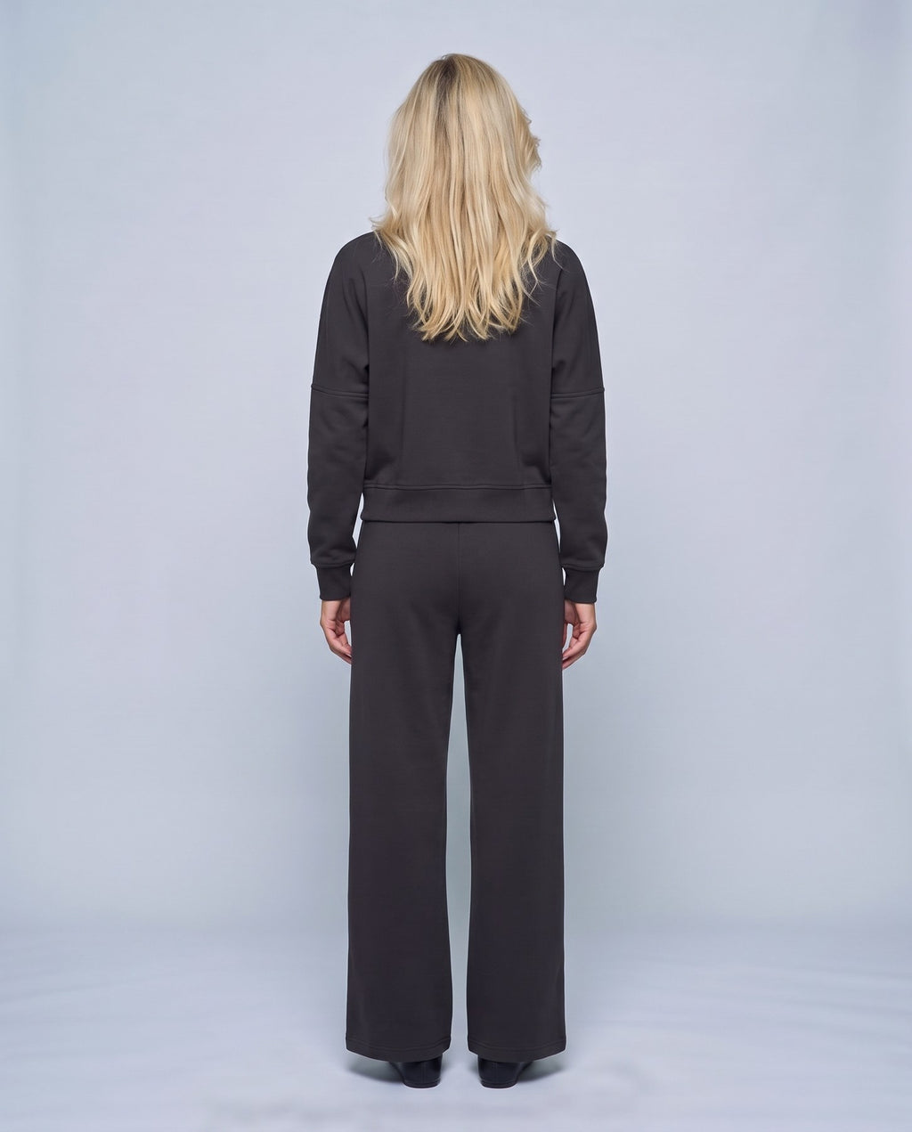 Sasha Zip Jacket & Pant Set in Black, back view on a non-pregnant model
