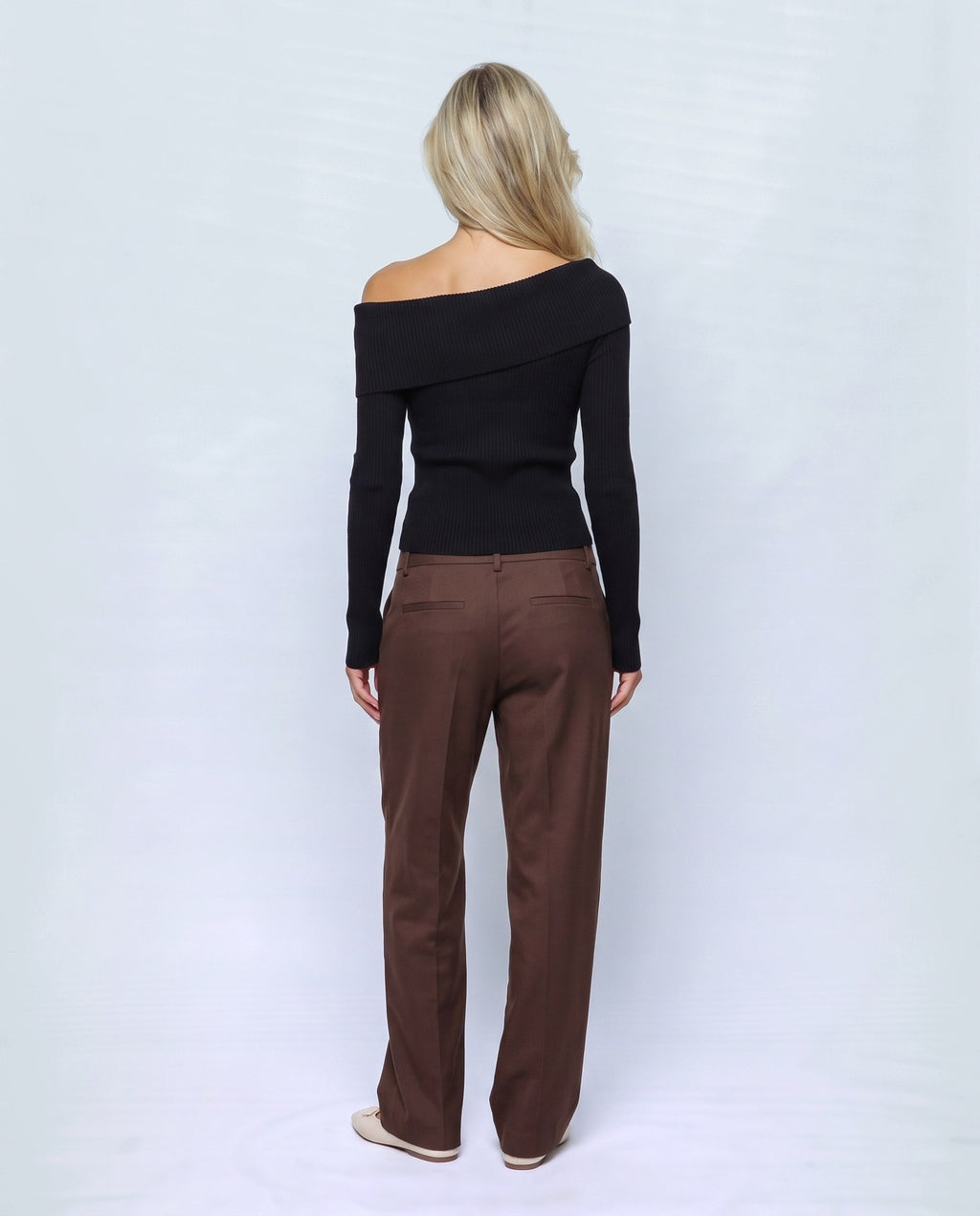 Violette Fold-Neck Sweater in Black, back view on a non-pregnant model